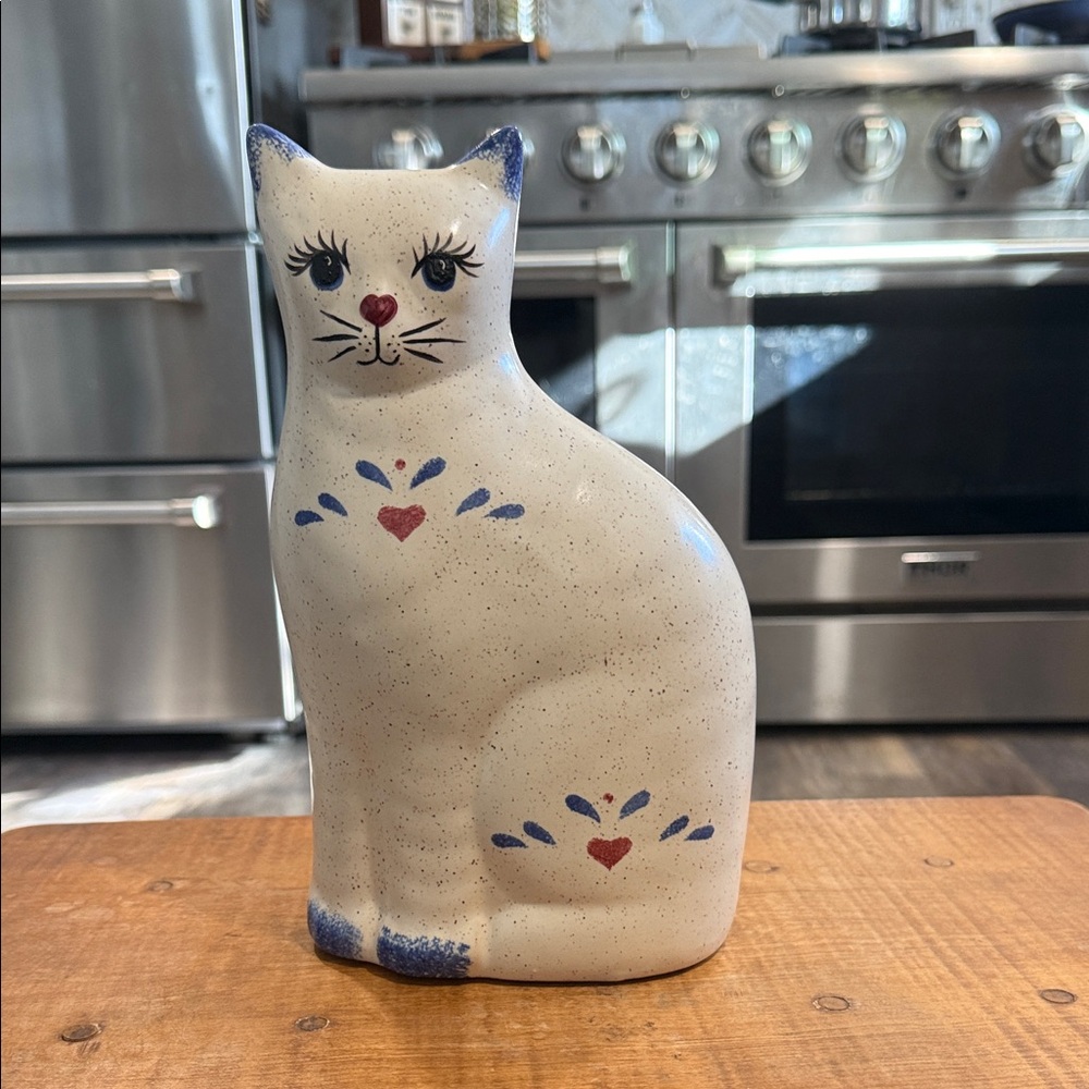 Charming Ceramic Cat with Blue and Red Details